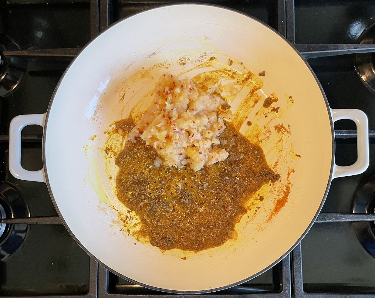 Chicken Korma, heated spices and raw blended onion